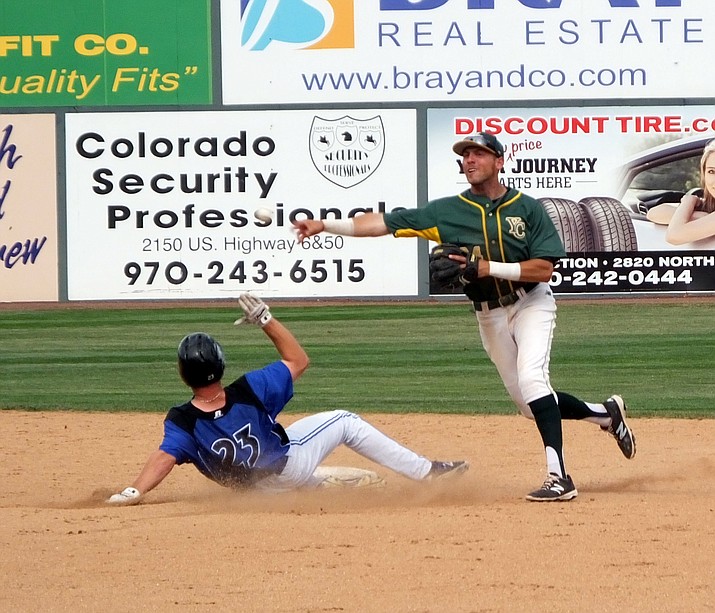 Yavapai College shortstop Ramsey Romano make a throw to first base on a double play against Iowa Western on Thursday in the Junior College Baseball World Series in Grand Junction, Colorado.