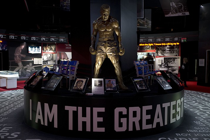 A statue of Muhammad Ali is displayed at the "I Am The Greatest, Muhammad Ali" exhibition at the O2 arena, which hosts high profile boxing fights in London, Saturday, June 4, 2016. Ali, the magnificent heavyweight champion whose fast fists and irrepressible personality transcended sports and captivated the world, died according to a statement released Friday by his family. He was 74. 