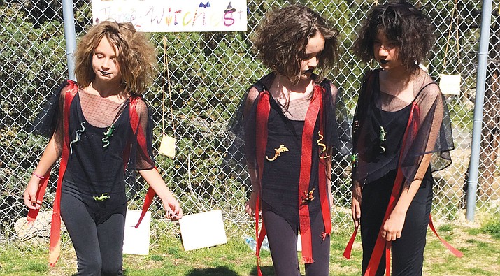Primavera’s three young lasses perform as the Three Witches, reciting famous lines of the “double, double, toil and trouble” played out in “Macbeth.” From left: Taylor English, Anya Valadez and Miranda Clark.