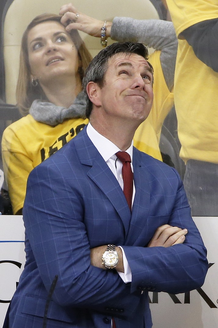 Pittsburgh Penguins coach Mike Sullivan looks up at the scoreboard as time runs down during the third period of Game 1 of the NHL hockey Stanley Cup Eastern Conference finals between the Penguins and the Tampa Bay Lightning on May 13 in Pittsburgh. The Lightning won 3-1. (Gene J. Puskar/Associated Press)
