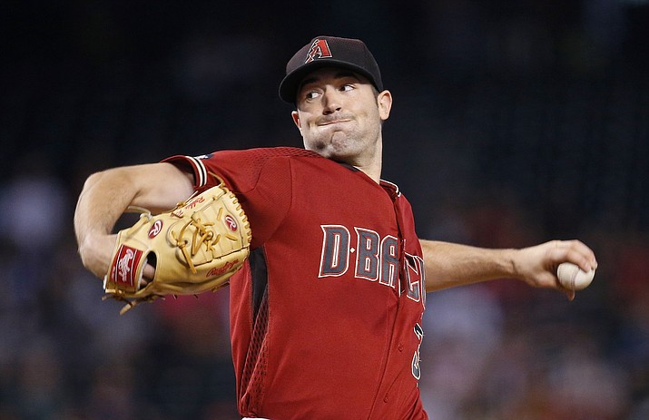 Arizona Diamondbacks' Robbie Ray throws a pitch against the Miami Marlins during their  game Sunday, June 12, in Phoenix.