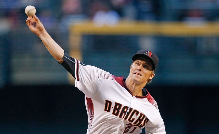 Diamondbacks' Zack Greinke throws a pitch against the Los Angeles Dodgers during their  game Monday, June 13, in Phoenix. 