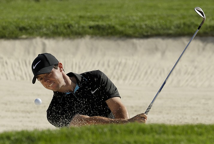 Rory McIlroy, of Northern Ireland, hits out of the bunker on the 13th hole during a practice round for the U.S. Open golf championship at Oakmont Country Club on Tuesday, June 14, in Oakmont, Pa.