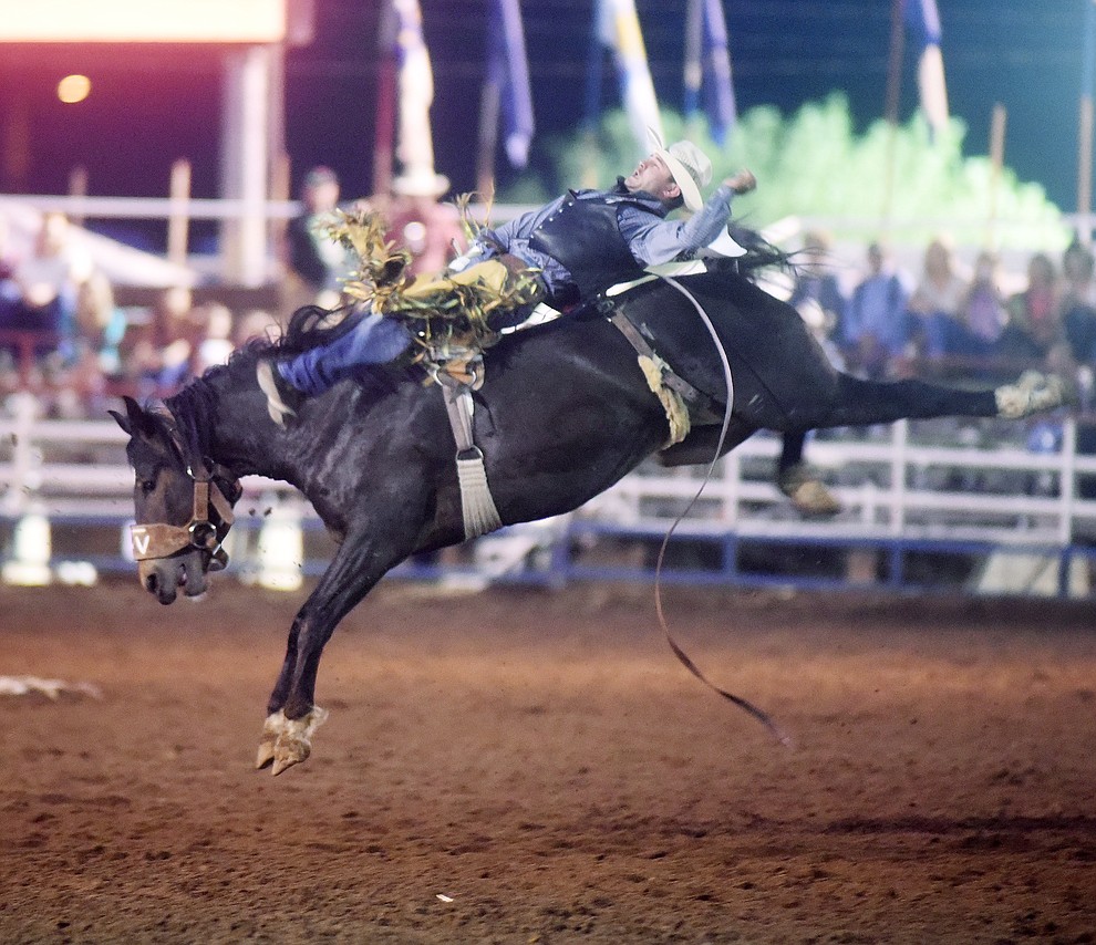 Blake Smith and Drop Dead Diva scored 78 in the Bareback during the first round of the Prescott Frontier Days Rodeo Tuesday night. (Les Stukenberg/The Daily Courier)