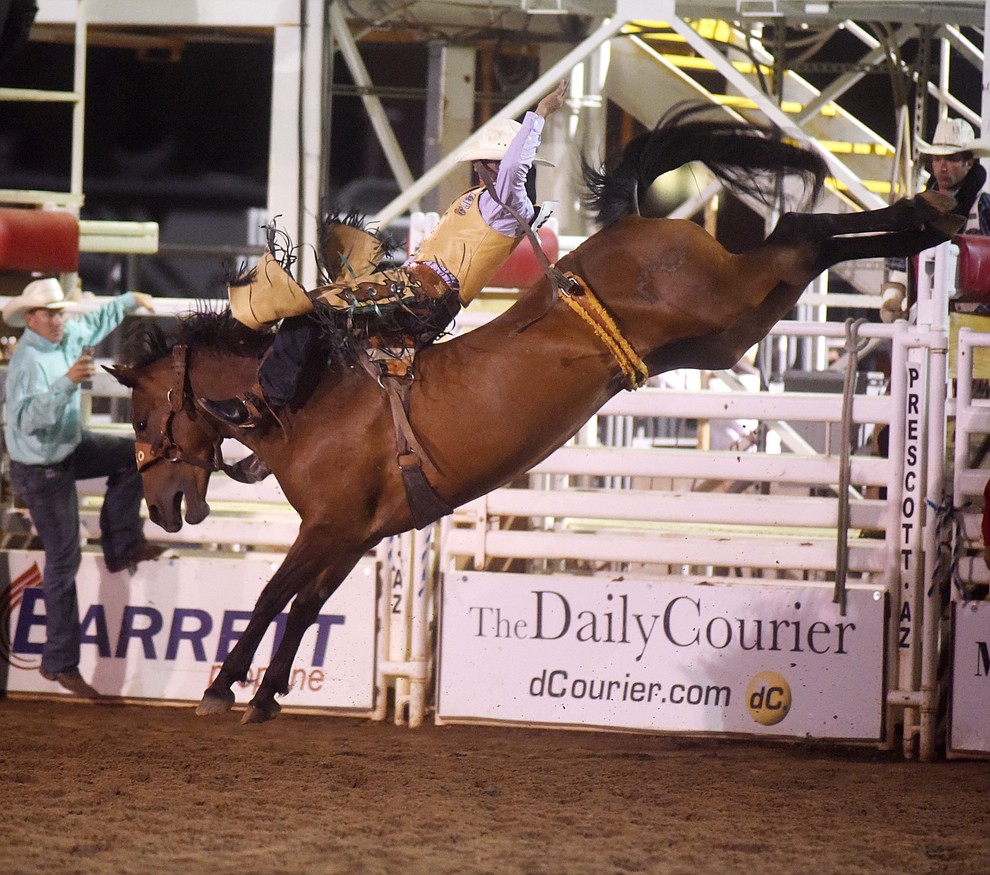 Devan Reilly scores 81 on Billie in the Bareback during the first round of the Prescott Frontier Days Rodeo Tuesday night. (Les Stukenberg/The Daily Courier)