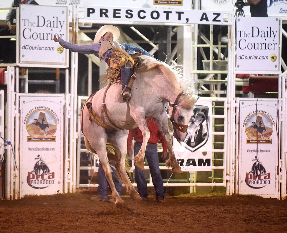 Sam Harper earned a reride for this Saddle Bronc ride on Garden City Gal during the first round of the Prescott Frontier Days Rodeo Tuesday night. (Les Stukenberg/The Daily Courier)