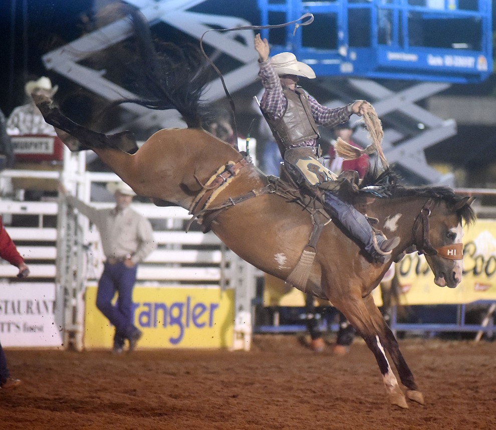 Toby Collins scored 79 on Peanut Butter Oreo in the Saddle Bronc Riding during the first round of the Prescott Frontier Days Rodeo Tuesday night. (Les Stukenberg/The Daily Courier)