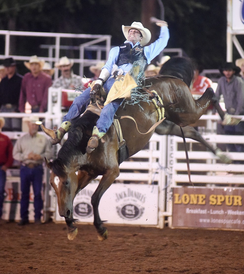 Wyatt Clark scores 69 on Toma Jo in the Bareback during the first round of the Prescott Frontier Days Rodeo Tuesday night. (Les Stukenberg/The Daily Courier)