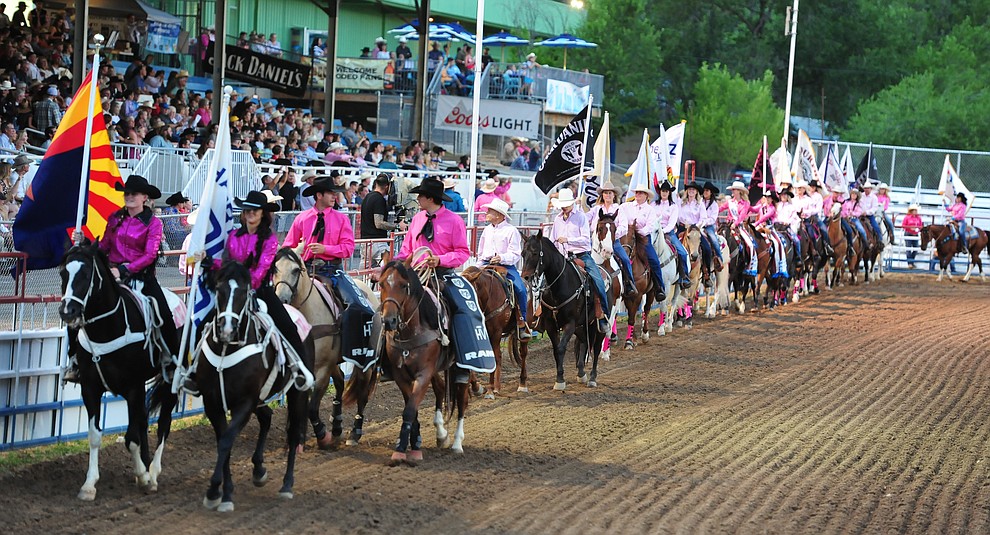 The grand entry during the second round of the Prescott Frontier Days Rodeo Wednesday night. (Les Stukenberg/The Daily Courier)during the second round of the Prescott Frontier Days Rodeo Wednesday night. (Les Stukenberg/The Daily Courier)