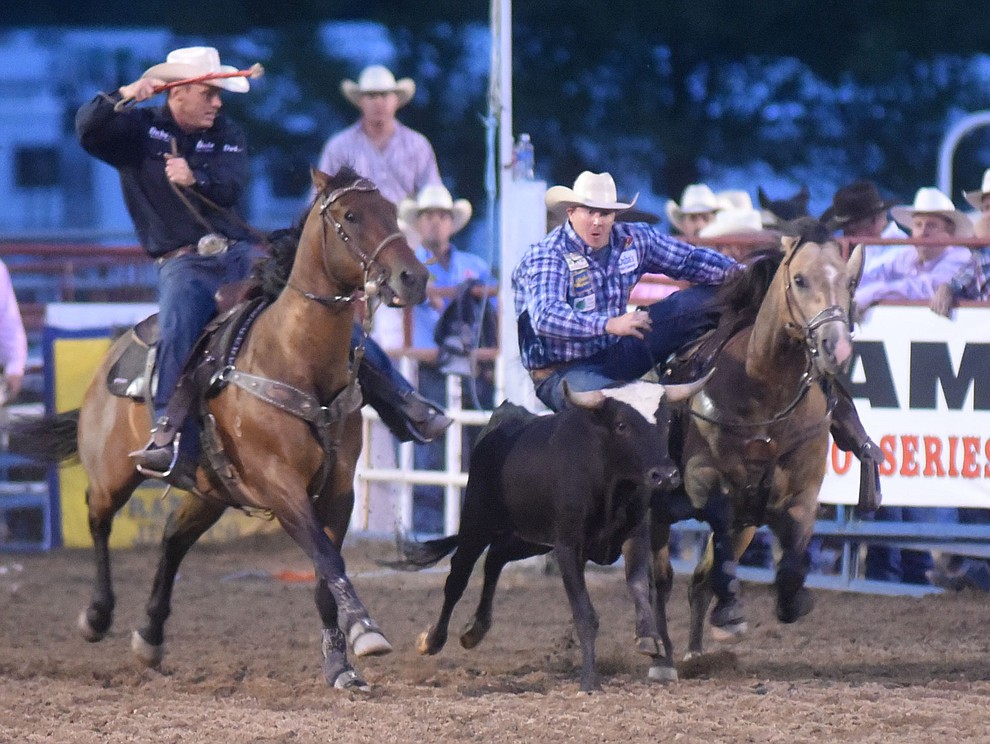 Nick Guy was 8.2 seconds on his steer wrestling run during the second round of the Prescott Frontier Days Rodeo Wednesday night. (Les Stukenberg/The Daily Courier)