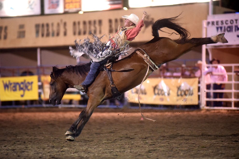 Ty Breuer scored 80 points on Branded in his bareback ride in the second round of the Prescott Frontier Days Rodeo Wednesday night. (Les Stukenberg/The Daily Courier)
