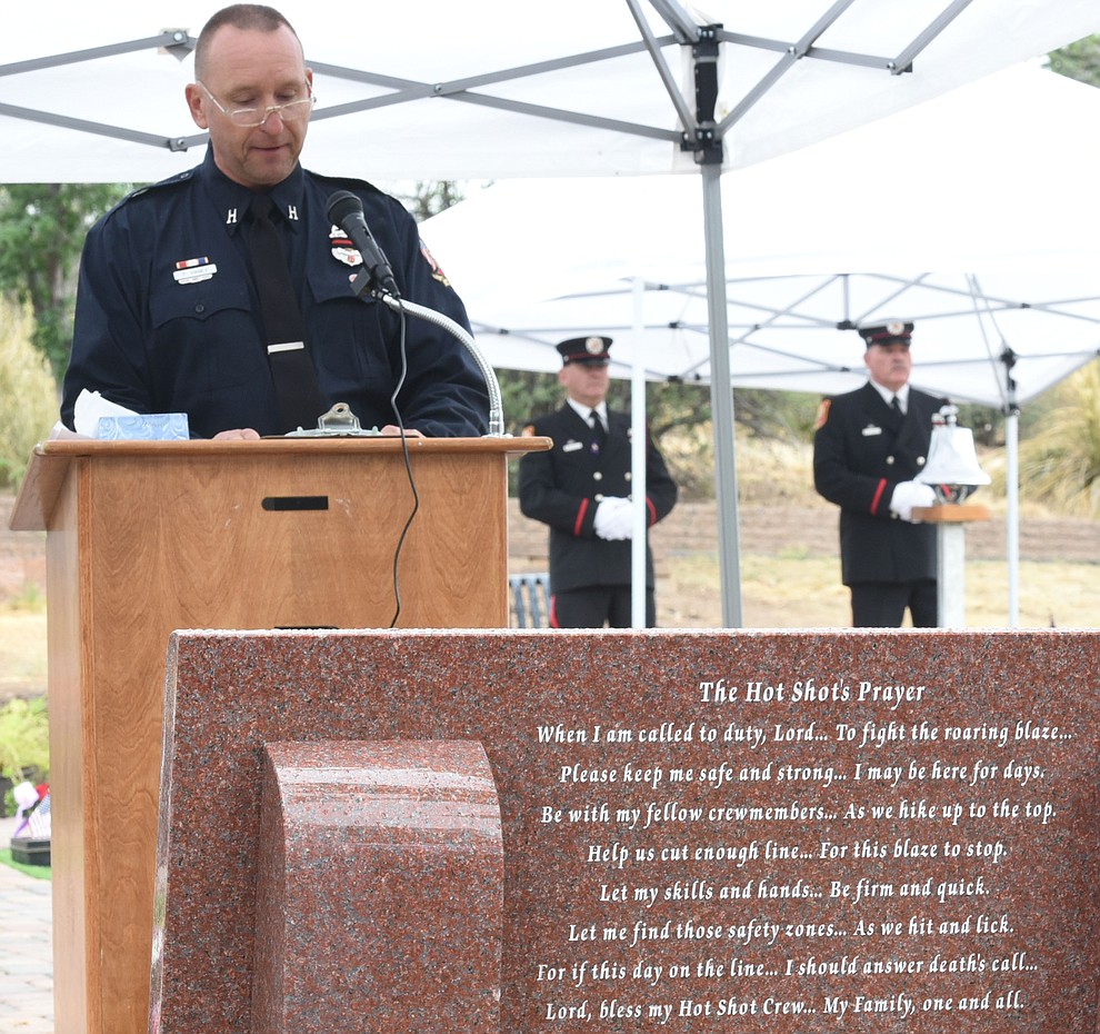 Tom Haney makes opening remarks during a Celebration of Remembrance ceremony at the Arizona Pioneer's Home Cemetery on the third anniversary of the death's of the 19 Granite Mountain Hotshots while fighting the Yarnell Hill Fire. (Les Stukenberg/The Daily Courier)