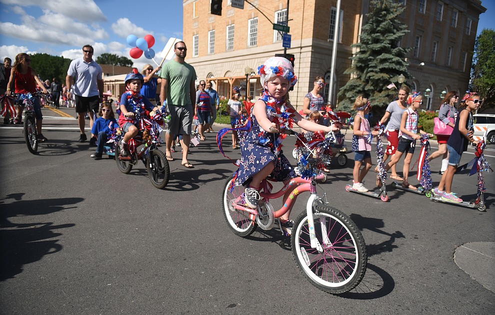 Bikes and scooters head down Cortez Street during the 75th annual Kiwanis Kiddie Parade through downtown Prescott Friday morning. (Les Stukenberg/The Daily Courier)