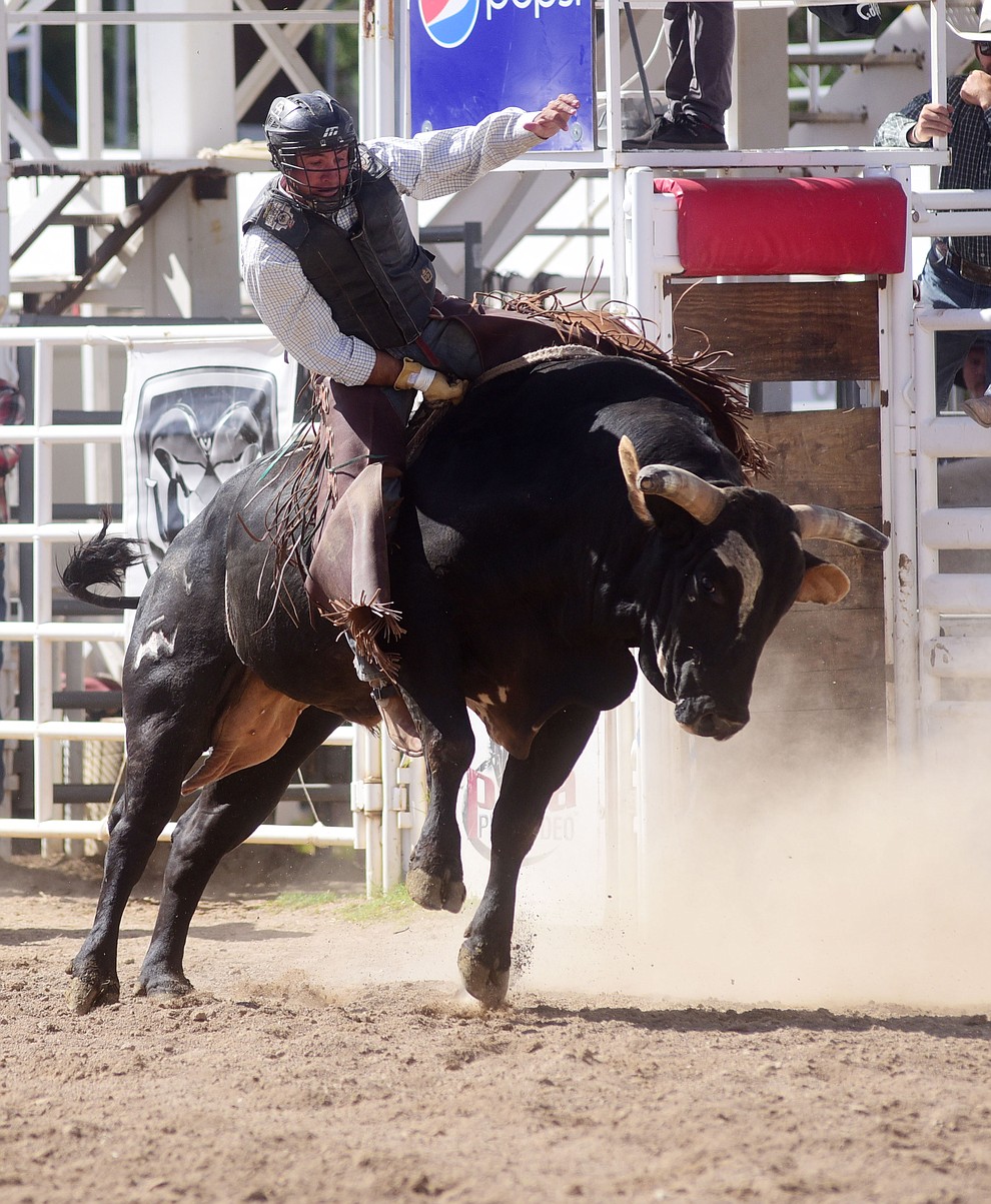 Camo Mullins on Bad Attitude during the final performance of the 2016 Prescott Frontier Days Rodeo Monday afternoon. (Les Stukenberg/The Daily Courier)