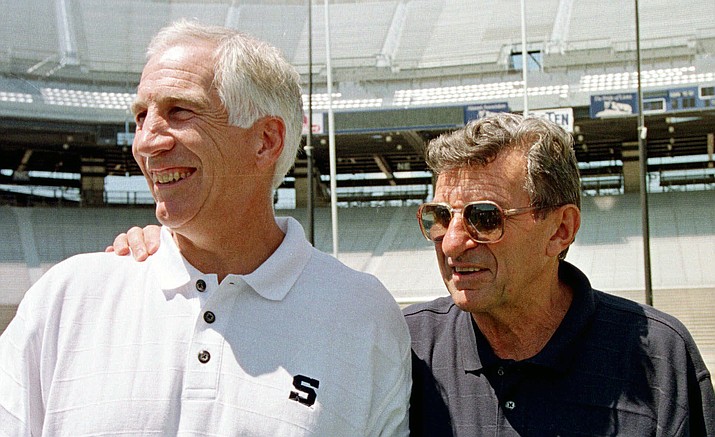 Penn State football coach Joe Paterno, right, poses with his defensive coordinator Jerry Sandusky, during the college football team's 1999 media day in State College, Pa.  Newly released court documents provided new details Tuesday, July 12, 2016, on allegations that Paterno was told in 1976 about a sex abuse accusation against  Sandusky, and that some of Paterno's assistants witnessed improper contact between Sandusky and children in the 1980s. Sandusky, who was arrested in 2011, is serving 30 to 60 years in prison on a 45-count child molestation conviction.