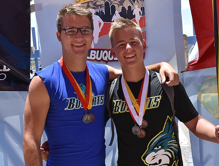 Ryan Shaver, 17, left, and his 14-year-old brother Noah Shaver pose for a photo at the USATF Region 10 Youth Outdoor Track and Field Championships in Albuquerque, New Mexico. The Shaver brothers will compete in the National Junior Olympic Track and Field Championships at the end of July in Sacramento, California. (Ken Shaver/Courtesy)