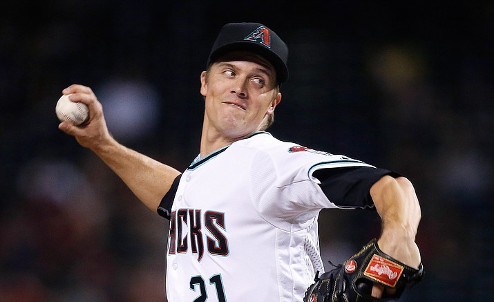 In this June 7, file photo, Arizona Diamondbacks’ Zack Greinke throws a pitch against the Tampa Bay Rays during the second inning of a baseball game in Phoenix. Greinke is making slow progress in his return from injury, too slow for his liking. “It would have been nice to be back a week ago,’’ he said before Wednesday’s, July 20, game against Toronto, his first public comments since he went on the disabled list July 3 with a left oblique strain.