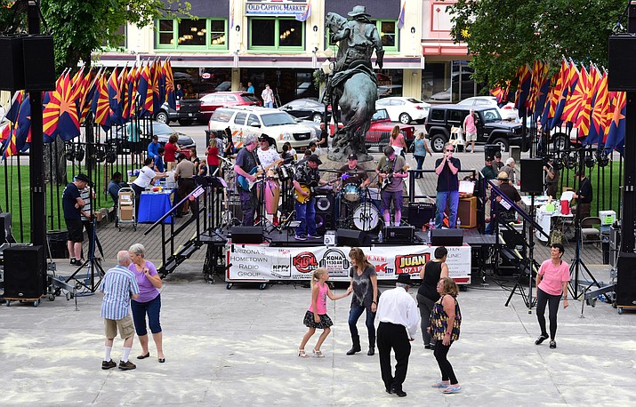 Road One South entertains hundreds of people on the Yavapai County Courthouse Square as part of the National Night Out Kickoff Event Friday night in Prescott.  (Les Stukenberg/The Daily Courier)