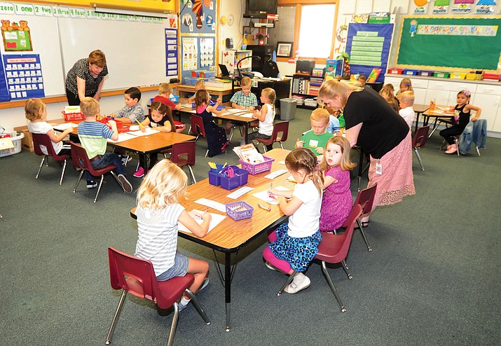 Kindergarten students are on task first thing in the morning during the first day of the 2016-17 school year at Abia Judd Elementary School in Prescott.