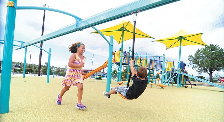 Children play at the Kayla's Hands Playground at Pioneer Park in Prescott Tuesday afternoon, Aug. 16.