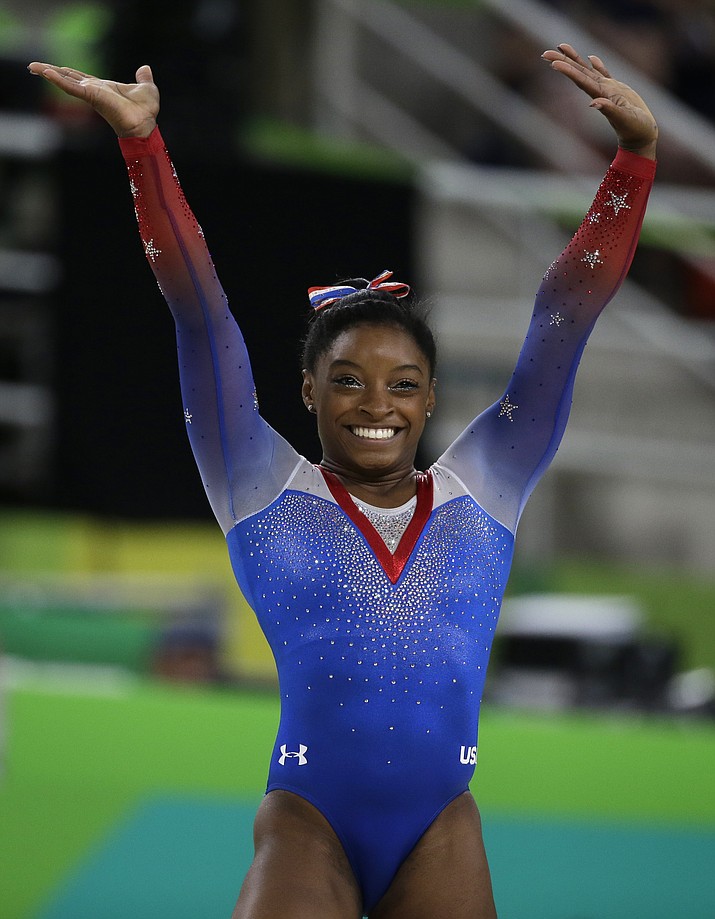 United States’ Simone Biles completes her routine on the floor during the artistic gymnastics women’s apparatus final Tuesday at the 2016 Summer Olympics in Rio de Janeiro, Brazil.