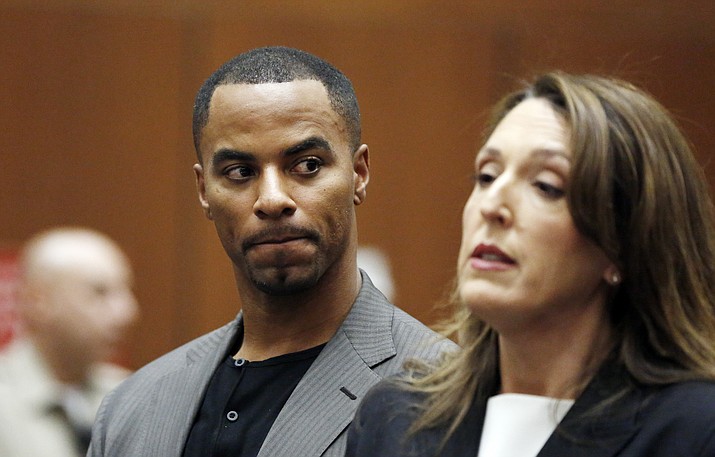 In this Feb. 20, 2014, file photo, Darren Sharper looks toward his attorney, Blair Berk, during an appearance in Los Angeles Superior Court. (Mario Anzuoni/Associated Press, File)
