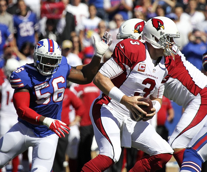Arizona Cardinals quarterback Carson Palmer is pressured by Buffalo Bills linebacker Lerentee McCray during the first half of an NFL football game on Sunday, Sept. 25, in Orchard Park, N.Y.