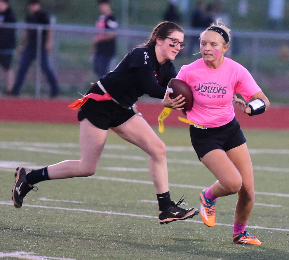 Highlights from the annual powderpuff game as part of Homecoming/Spirit Week at Bradshaw Mountain High School which was held Wednesday, September 28, 2016. The seniors (in black) shutout the juniors 18-0.  (Les Stukenberg/The Daily Courier Photo)
