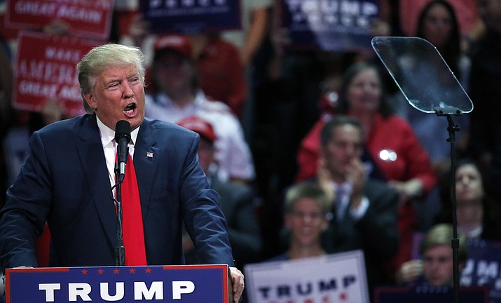 Republican presidential candidate Donald Trump speaks at a campaign rally, Monday, Oct. 3, in Loveland, Colo.