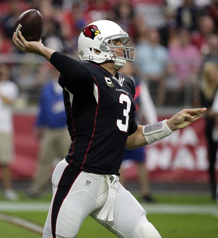 Arizona Cardinals quarterback Carson Palmer throws against the Los Angeles Rams during the first half of an NFL football game, Sunday, Oct. 2, in Glendale.