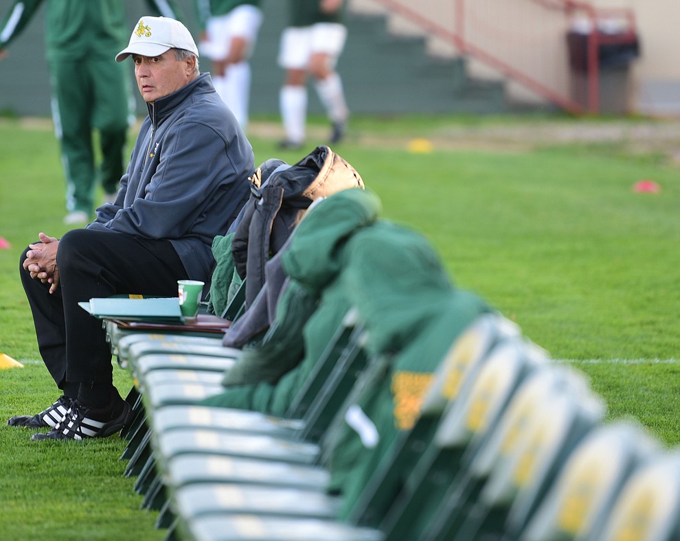 Yavapai Head Coach Mike Pantalione surveys the field as the Roughriders prepare to host Phoenix College in a soccer matchup Thursday, October 6, 2017 in Prescott. (Les Stukenberg/The Daily Courier Photo)