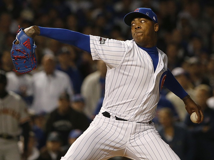 Chicago Cubs relief pitcher Aroldis Chapman throws in the ninth inning of Game 2 of baseball's National League Division Series against the San Francisco Giants, Saturday, Oct. 8, in Chicago.