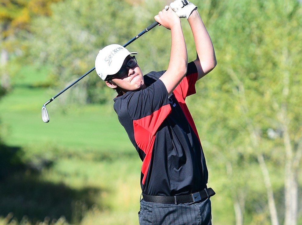 Bradshaw Mountain's #2 Bryce Preston hits an approach shot in a home match against Prescott, Mingus Union and Mohave Academy High Schools Tuesday, October 11, 2017 at Prescott Golf and Country Club. (Les Stukenberg/The Daily Courier)