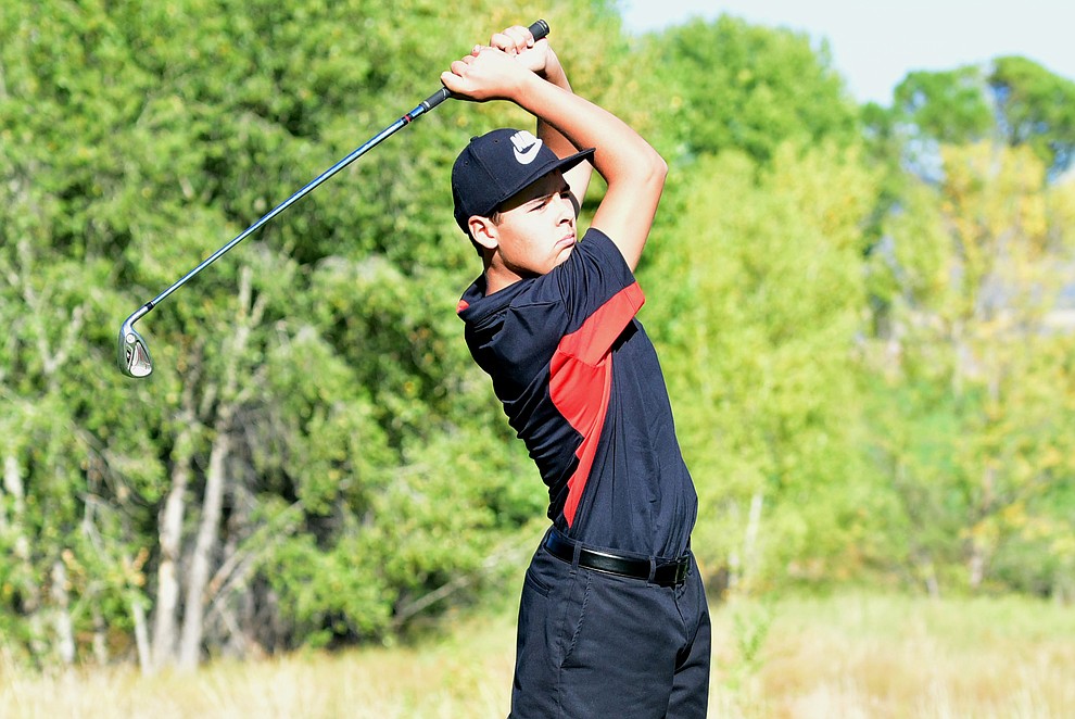 Bradshaw Mountain's #1 Carson Randa hits an approach shot in a home match against Prescott, Mingus Union and Mohave Academy High Schools Tuesday, October 11, 2017 at Prescott Golf and Country Club. (Les Stukenberg/The Daily Courier)
