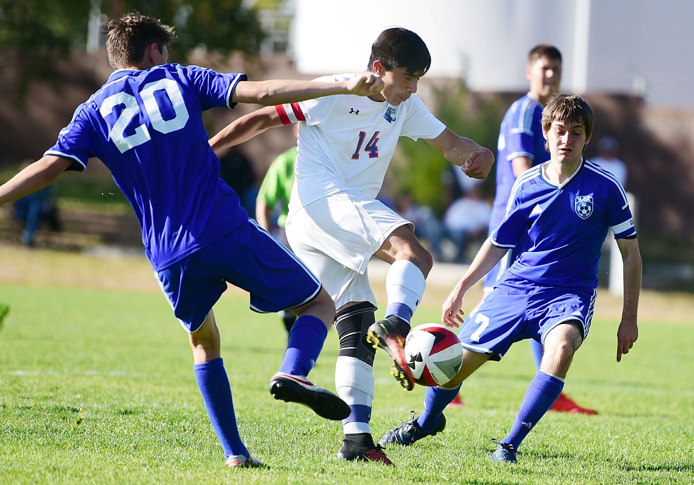 Chino Valley's Arturo Gomez (14) scores as the Cougars take on Northland Prep Academy in Chino Valley Thursday, October 13. (Les Stukenberg/The Daily Courier)