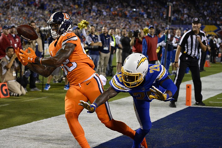 Denver Broncos wide receiver Demaryius Thomas can't hold on to an end zone pass as San Diego Chargers cornerback Casey Hayward defends during the second half of an NFL football game Thursday, Oct. 13, in San Diego.