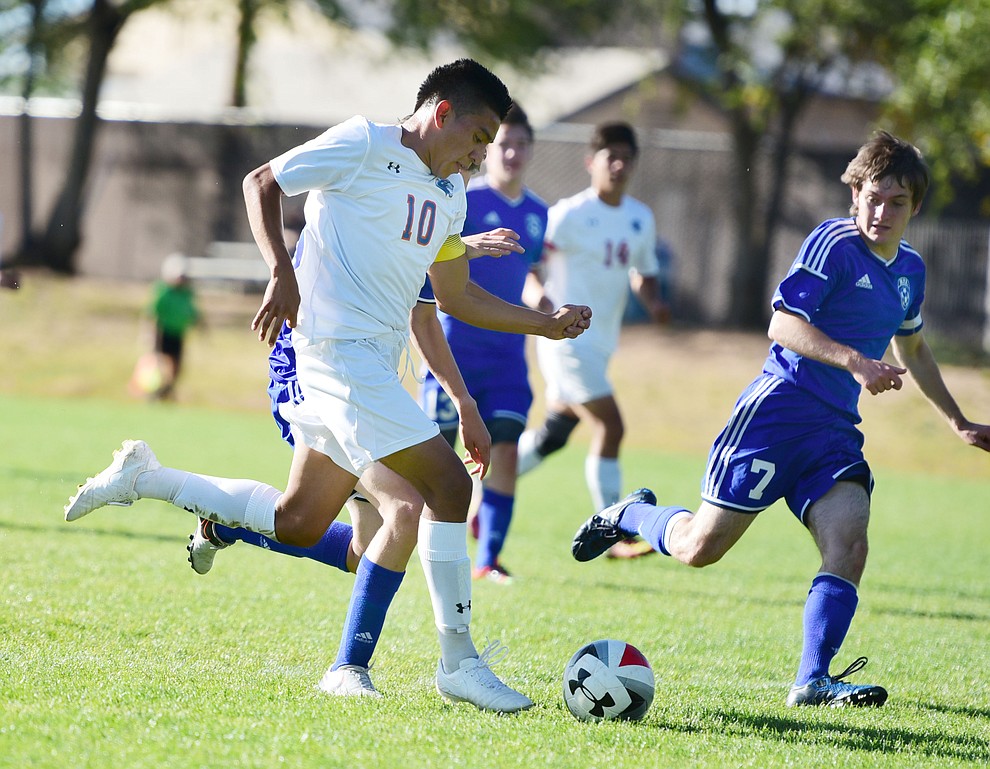 Chino Valley's Walter Soto (10) drives the ball deep as the Cougars take on Northland Prep Academy in Chino Valley Thursday, October 13. (Les Stukenberg/The Daily Courier)