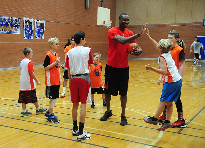 Former Phoenix Suns center Steven Hunter works with players in his Steven Hunter Life Skills and Basketball Academy at Prescott High School’s gym Thursday, October 13. 