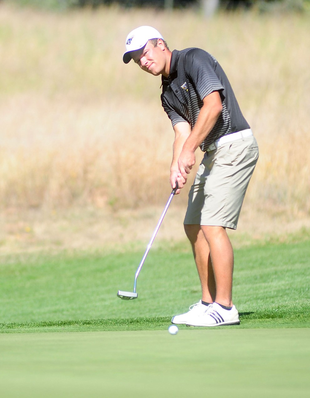 Embry Riddle's Matt Andrews putts for a birdie Monday during the Embry-Riddle Invitational at Talking Rock Golf Club in Prescott.