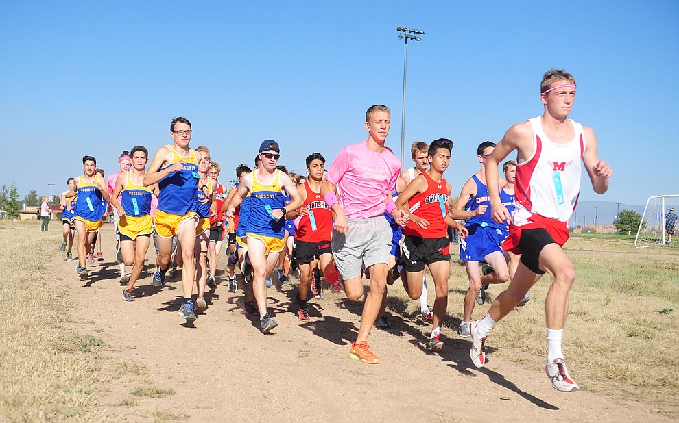 Mingus Union's Jon Ulibarri leads the field at the start during the Yavapai County Cross Country meet at Embry Riddle Aeronautical University in Prescott Wednesday, October 19.
