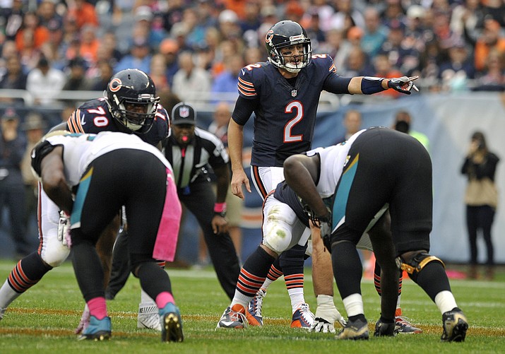 Chicago Bears quarterback Brian Hoyer (2) calls a play during an Oct. 16 NFL football game against the Jacksonville Jaguars in Chicago. The NFL's oldest rivalry will be renewed on Thursday night, Oct. 20, when the Chicago Bears visit the Green Bay Packers. It's the 193rd meeting between the NFC North rivals.