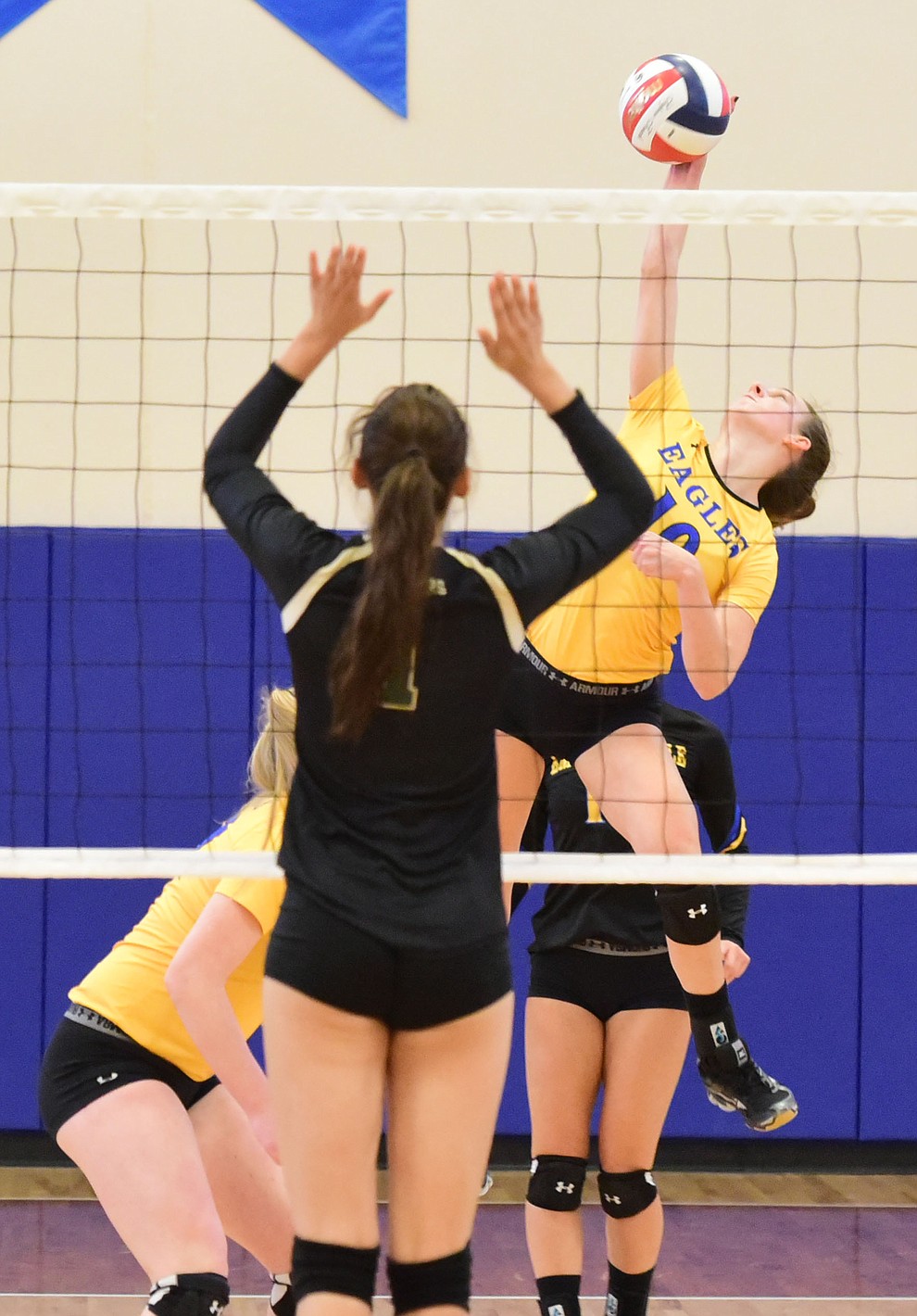 Embry Riddle's Jalin Yoder (10) sends a kill through the middle as the Lady Eagles take on Pacific Union College Friday afternoon in Prescott.