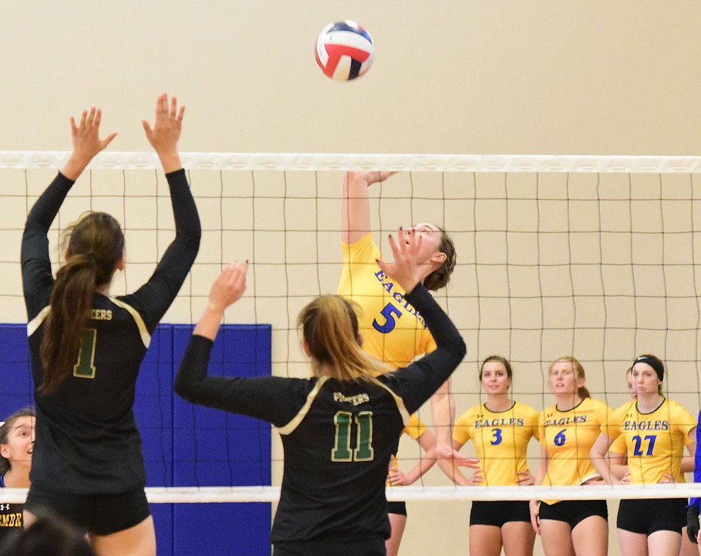 Embry Riddle's Jordan Jones (5) sends a kill cross court as the Lady Eagles take on Pacific Union College Friday afternoon in Prescott.