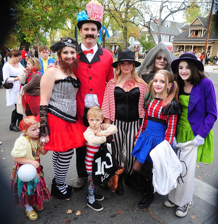 The Musick/Fisher families are ready for some candy at the iconic trick or treating on Halloween night along Mount Vernon Avenue in Prescott Monday night.