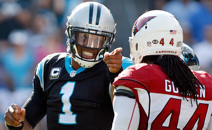 Carolina Panthers' Cam Newton (1) objects to a late hit by Arizona Cardinals' Markus Golden (44) in the second half of an NFL football game in Charlotte, N.C., Sunday, Oct. 30.