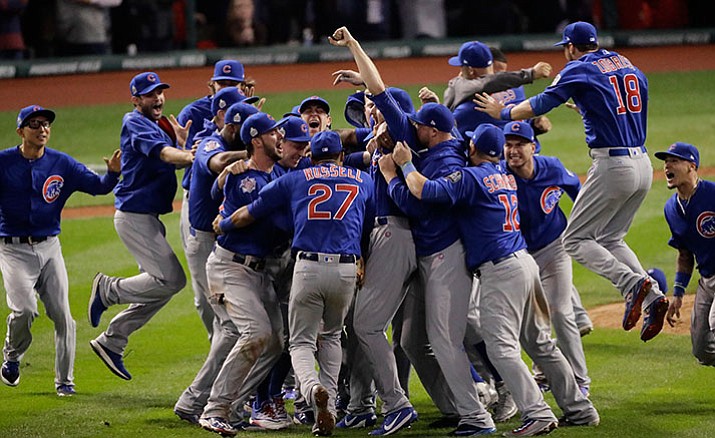 Chicago Cubs celebrate after Game 7 of the World Series against the Cleveland Indians on Thursday in Cleveland. The Cubs won 8-7 in 10 innings to win the series 4-3.