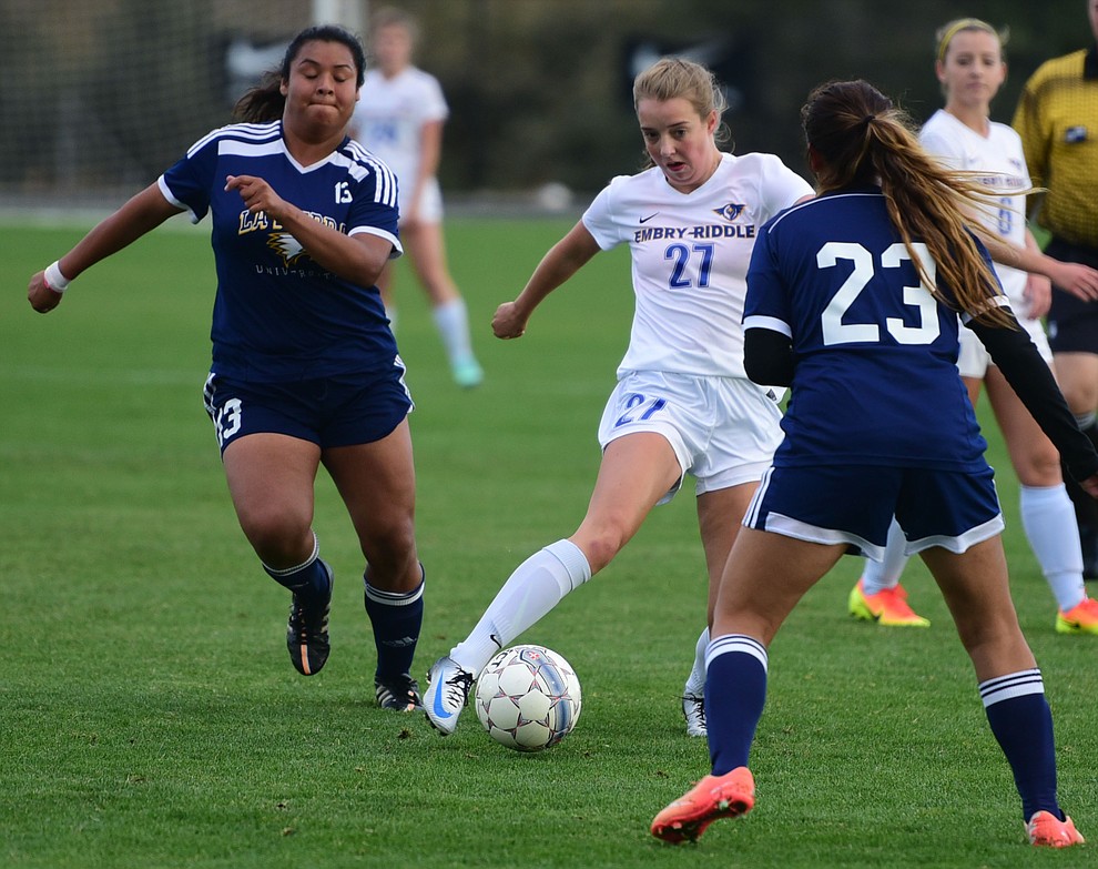 Embry Riddle's Erica Heil cuts between a pair of defenders as the Lady Eagles take on La Sierra in an afternoon matchup Thursday Nov. 3 in Prescott.
