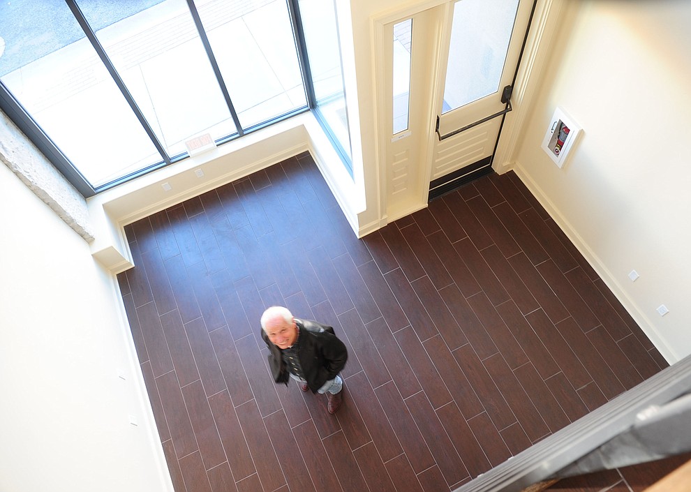 Frank DeGrazia, the architect of the Elks renovation stands in one of the retail spaces as the renovations for the Elks Opera House have been completed.as the renovations for the Elks Opera House have been completed.