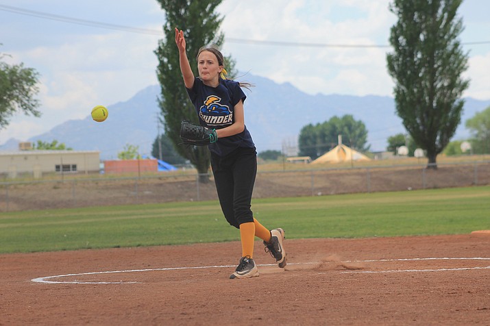 Majors softball player Ashlynn Kennelly throws a pitch during the District 10 tournament in July 2016.