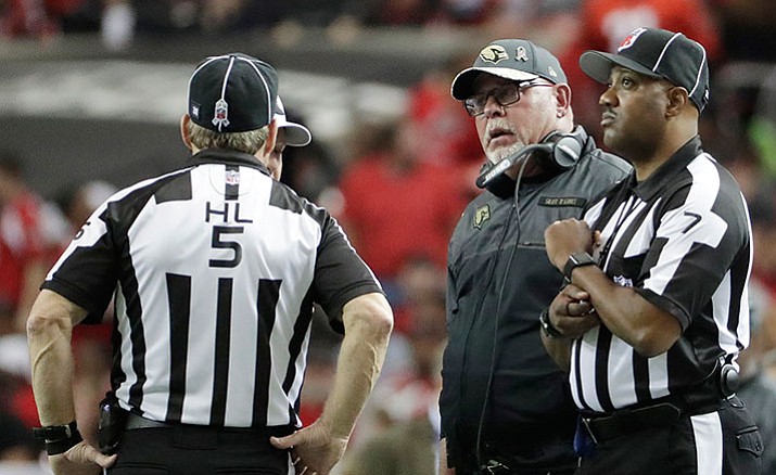 Arizona Cardinals head coach Bruce Arians speaks to officials during the first of an NFL football game between the Atlanta Falcons and the Arizona Cardinals, Sunday, Nov. 27.